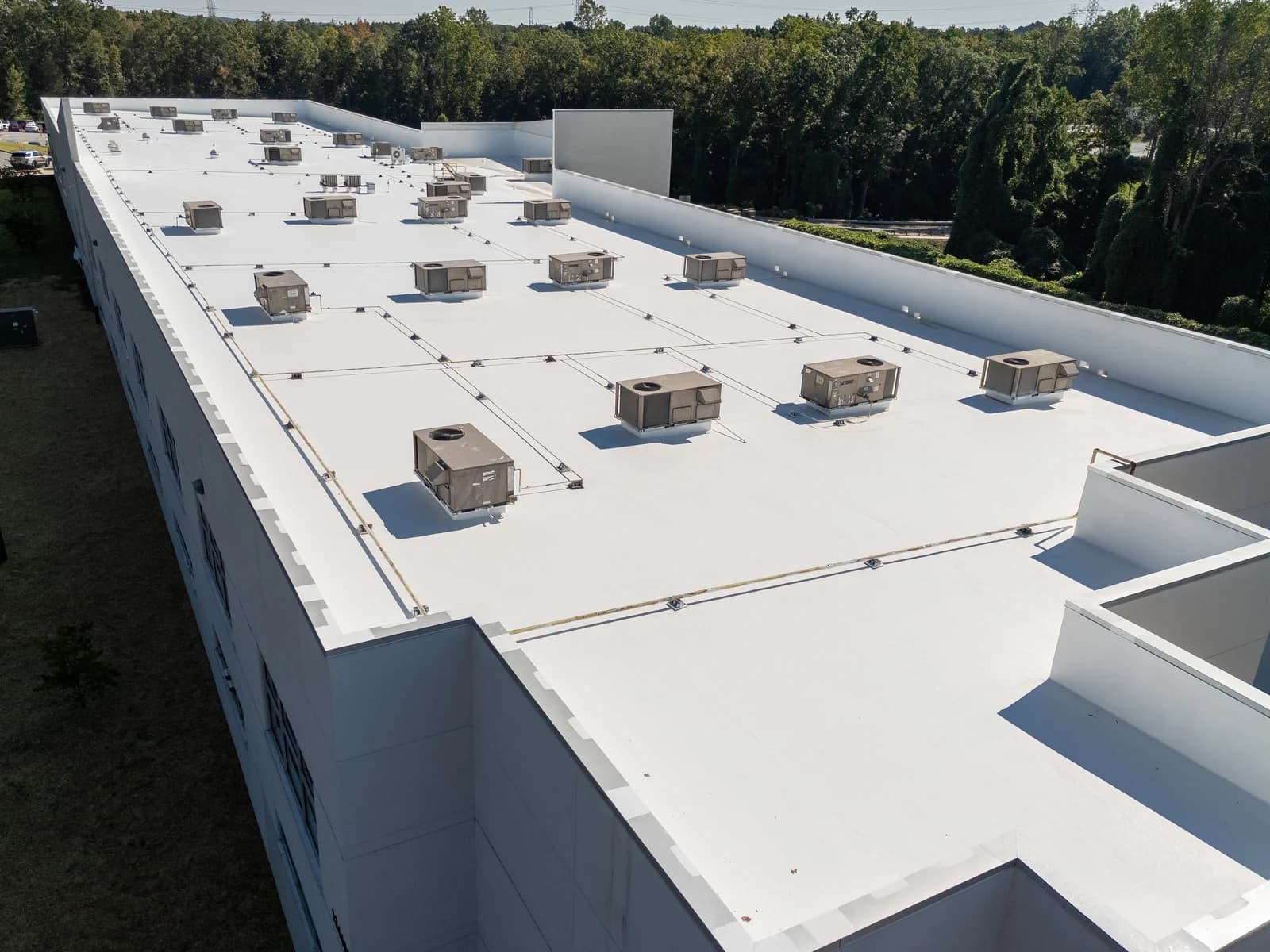 Mountain Island Charter School roof coating, aerial view 2 of completed multi-layer silicone system