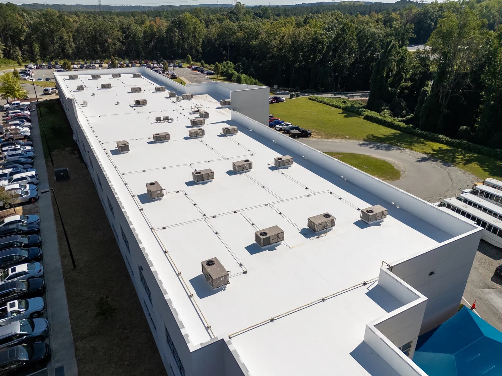 Mountain Island Charter School roof coating, aerial view 3 of completed multi-layer silicone system