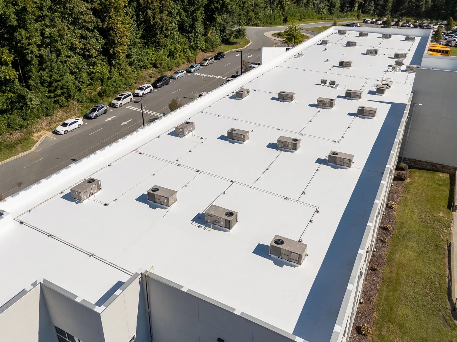 Mountain Island Charter School roof coating, aerial view 4 of completed multi-layer silicone system