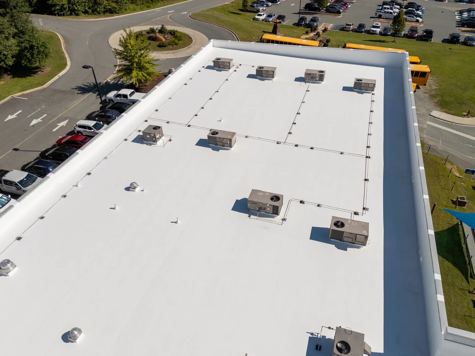 Mountain Island Charter School roof coating, aerial view 6 of completed multi-layer silicone system