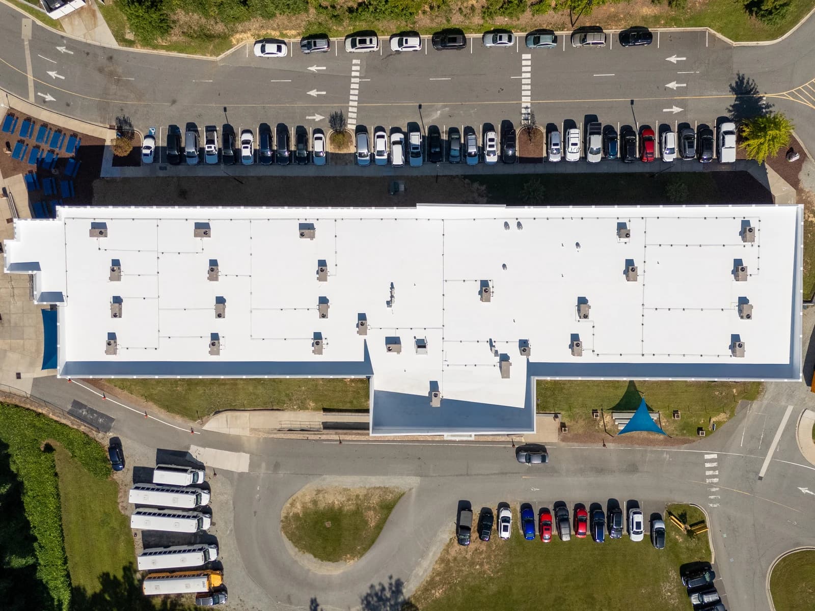 Mountain Island Charter School roof coating, aerial view 7 of completed multi-layer silicone system