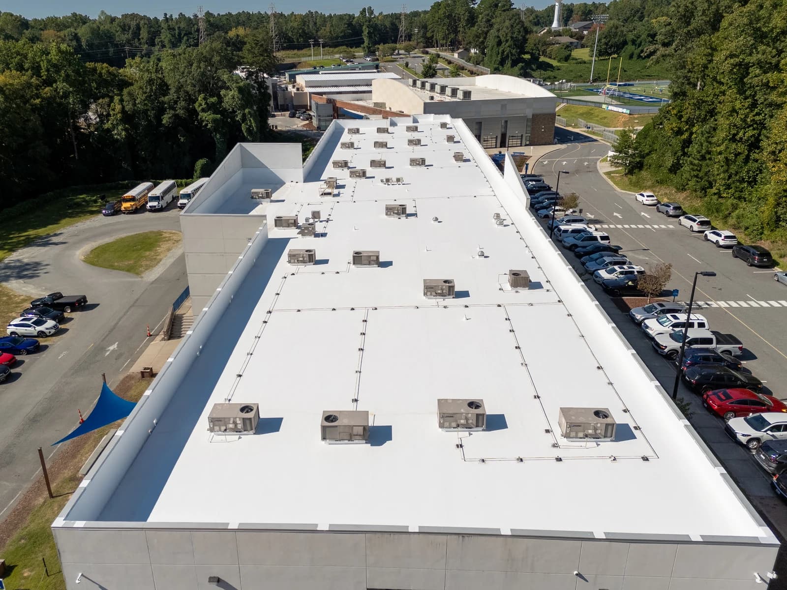 Mountain Island Charter School roof coating, aerial view 8 of completed multi-layer silicone system