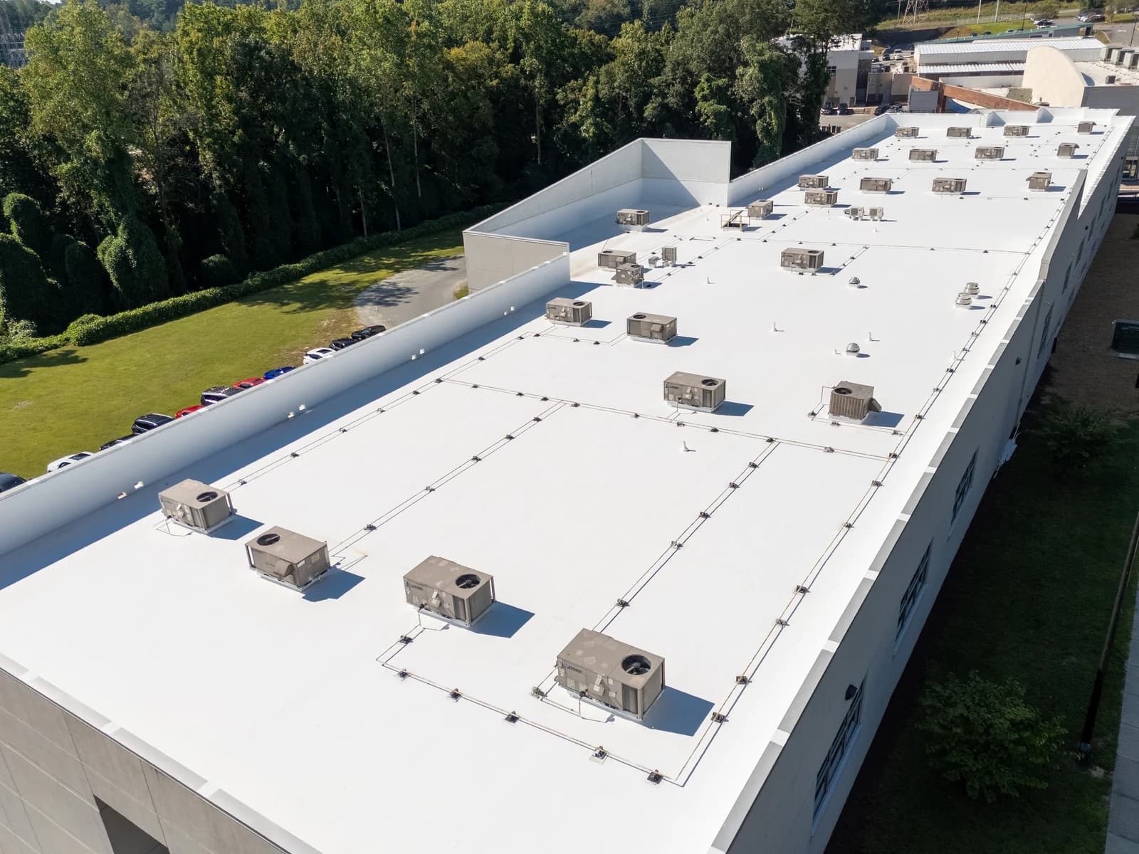 Mountain Island Charter School roof coating, aerial view 9 of completed multi-layer silicone system