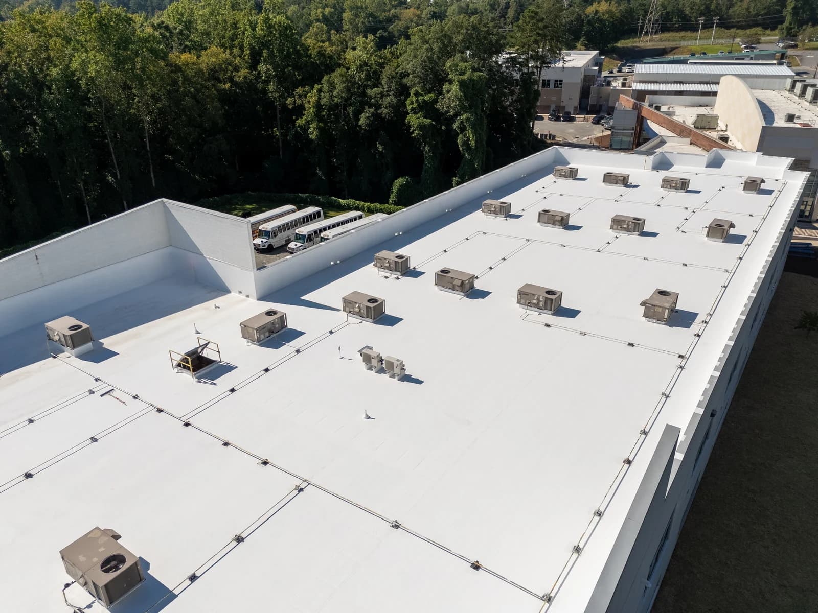 Mountain Island Charter School roof coating, aerial view 10 of completed multi-layer silicone system