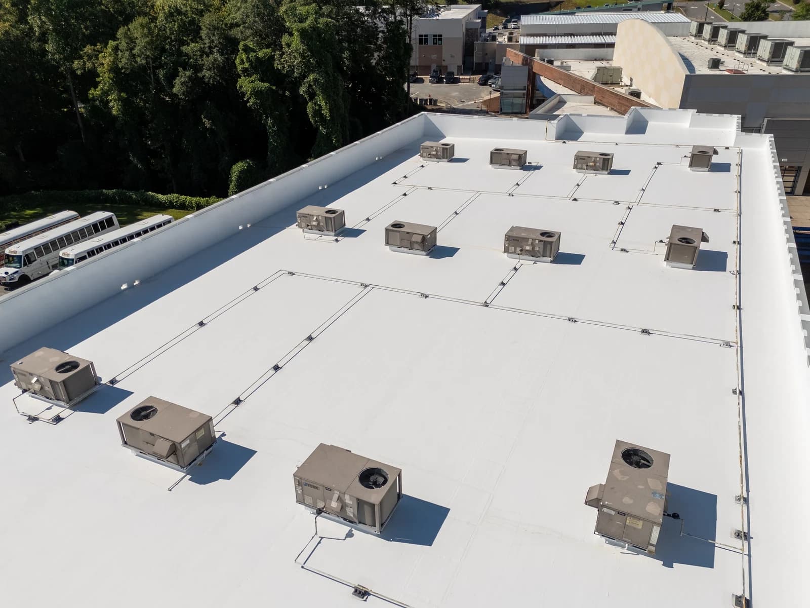 Mountain Island Charter School roof coating, aerial view 13 of completed multi-layer silicone system
