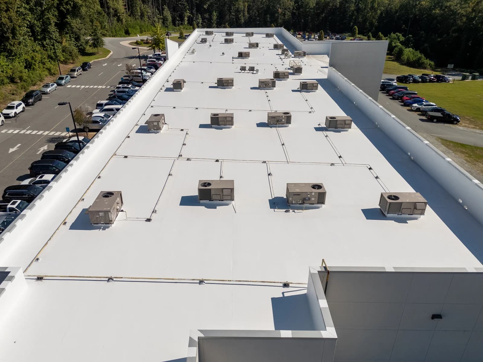 Mountain Island Charter School roof coating, aerial view 15 of completed multi-layer silicone system