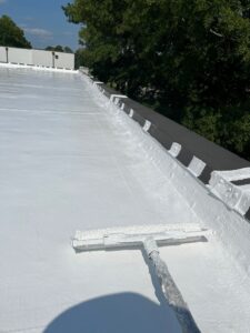 Rolling out roof coating